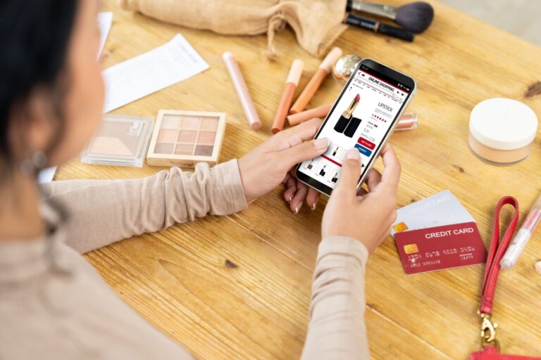 woman looking at an sms landing page on her phone