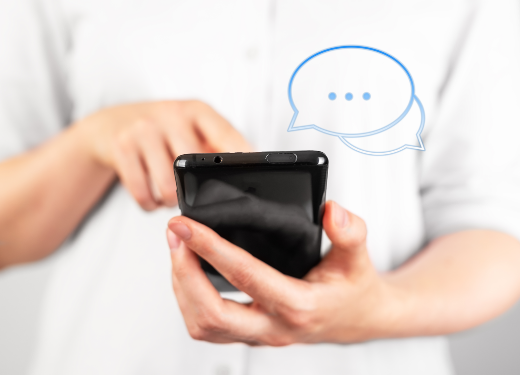 person receiving text messages on a mobile phone