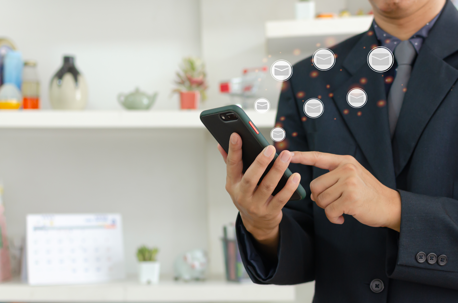 man using his phone for text messaging
