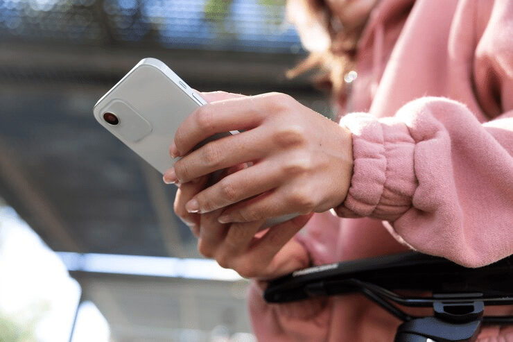 person scrolling on the phone