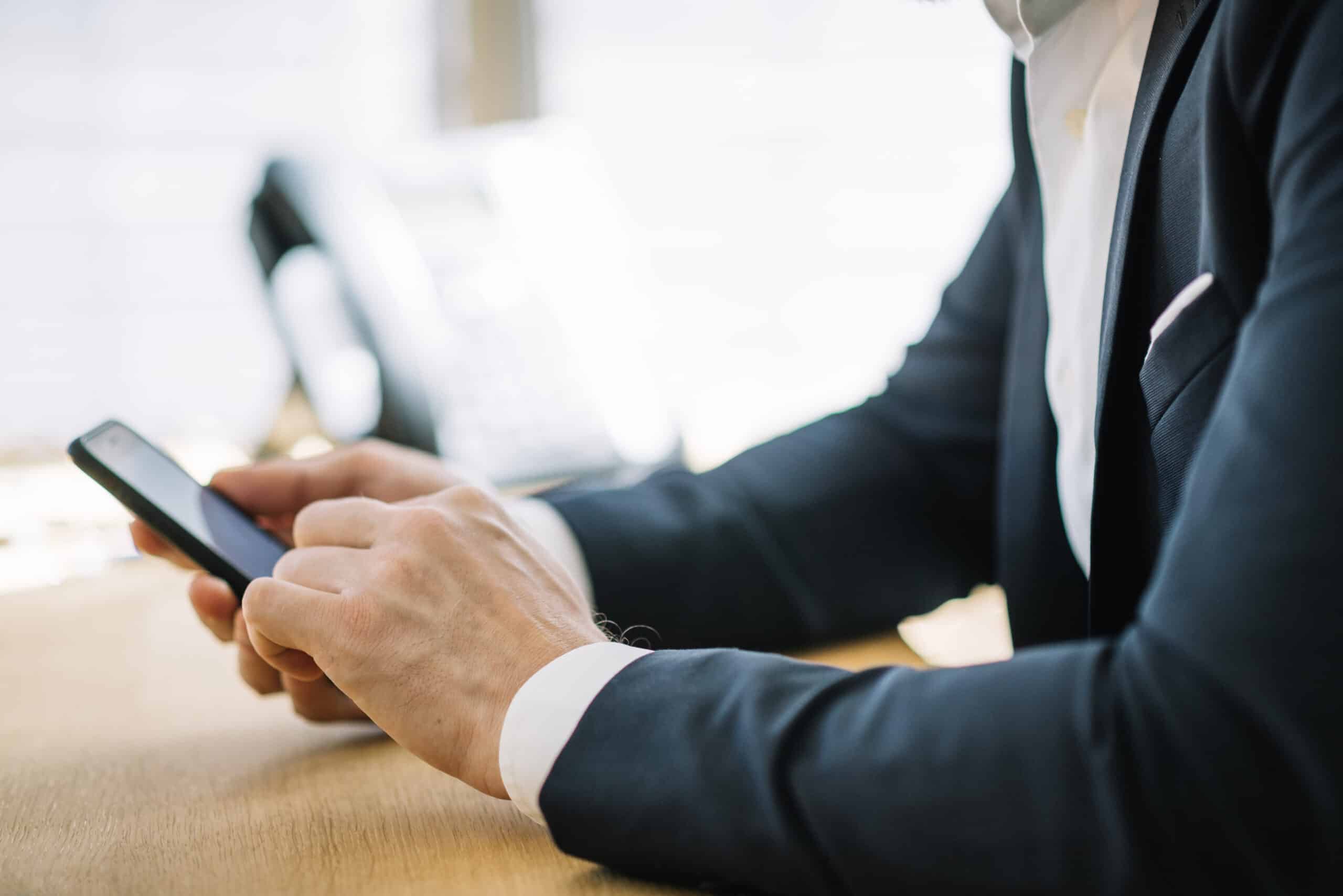 man browsing phone