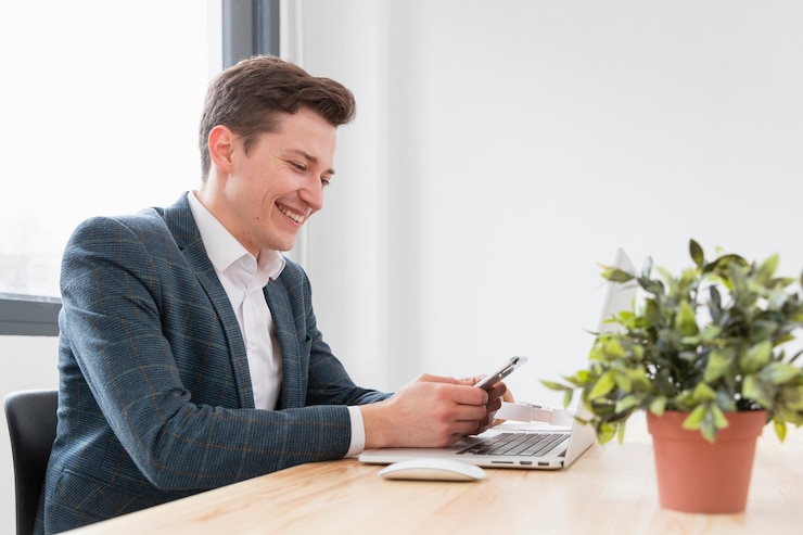 a businessman reading a text message