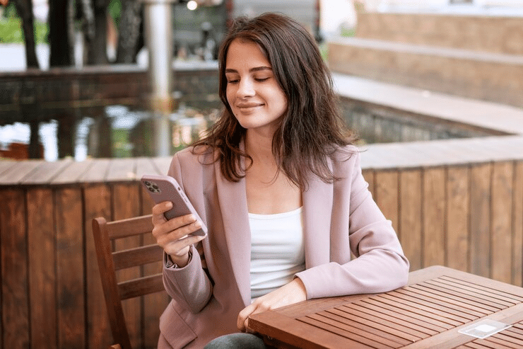 woman reading an sms message