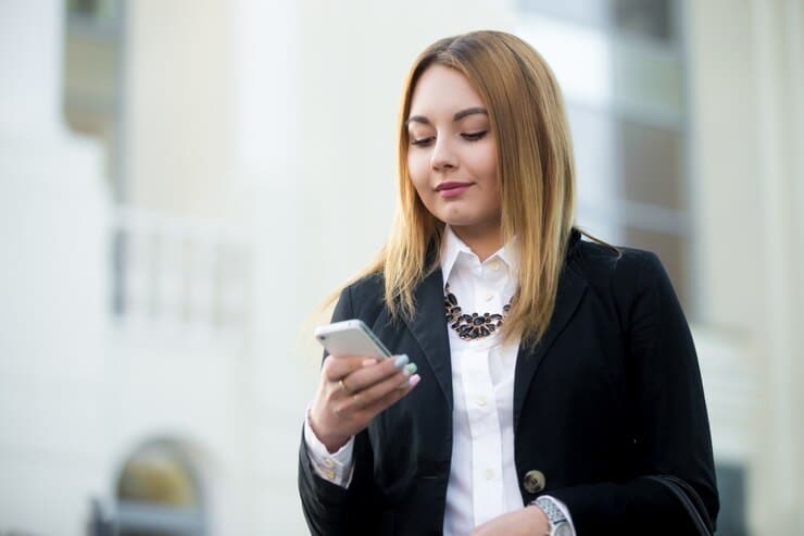 woman texting on a phone