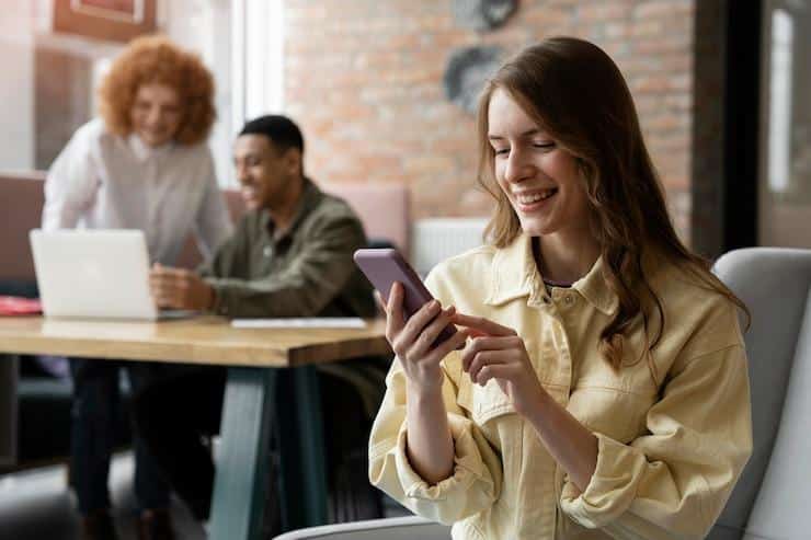woman sending a text message