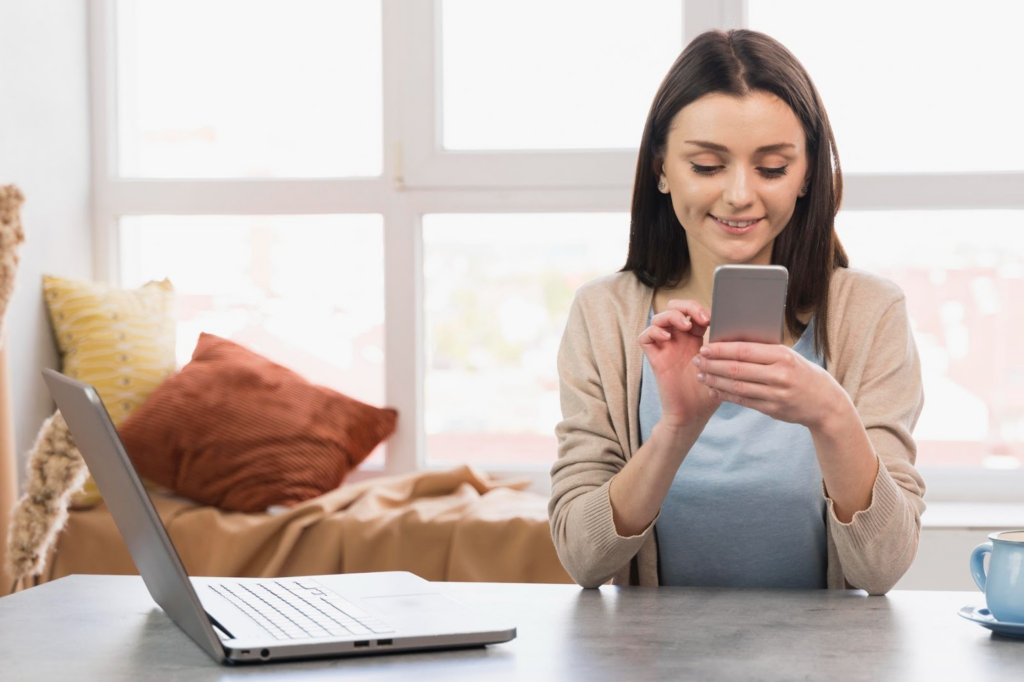 Woman reading an SMS on her phone