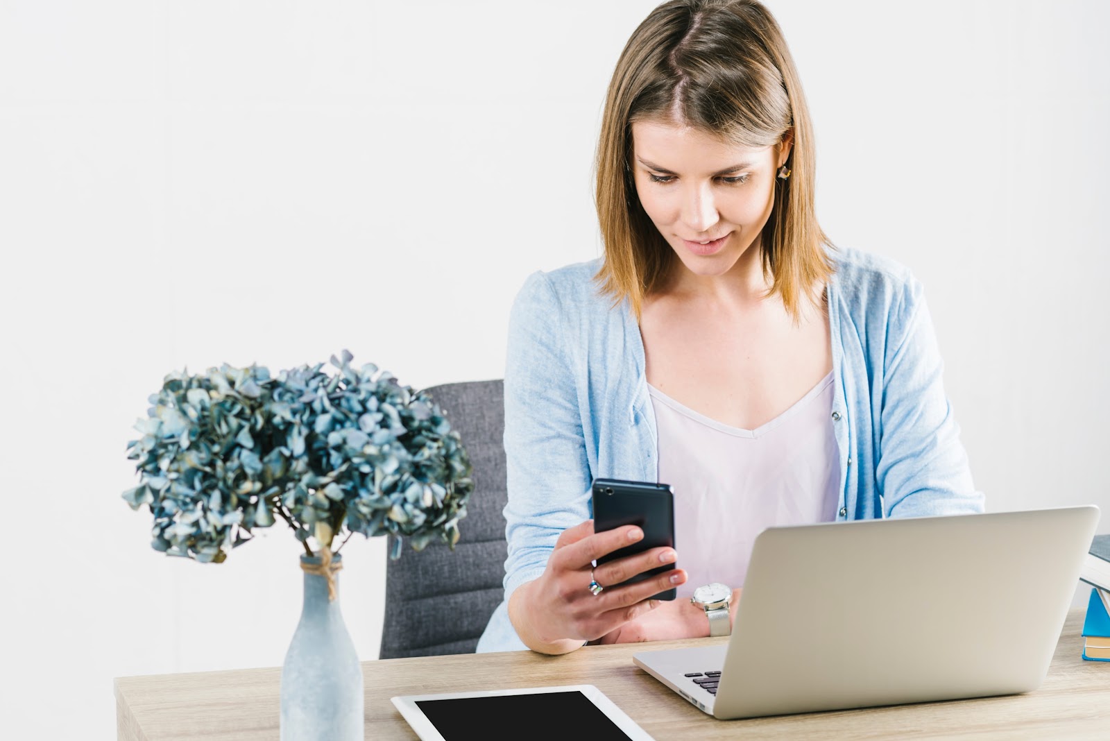 Woman reading an SMS on her phone