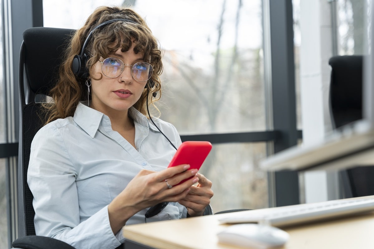 Customer service officer writing a text message
