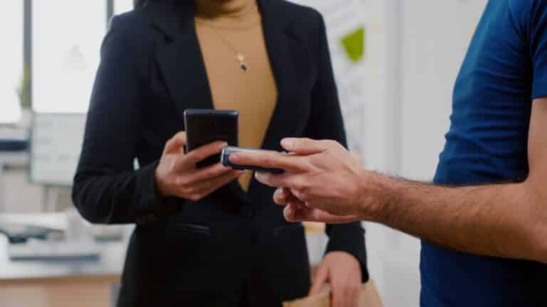 Person waiting for an SMS confirmation for a purchase