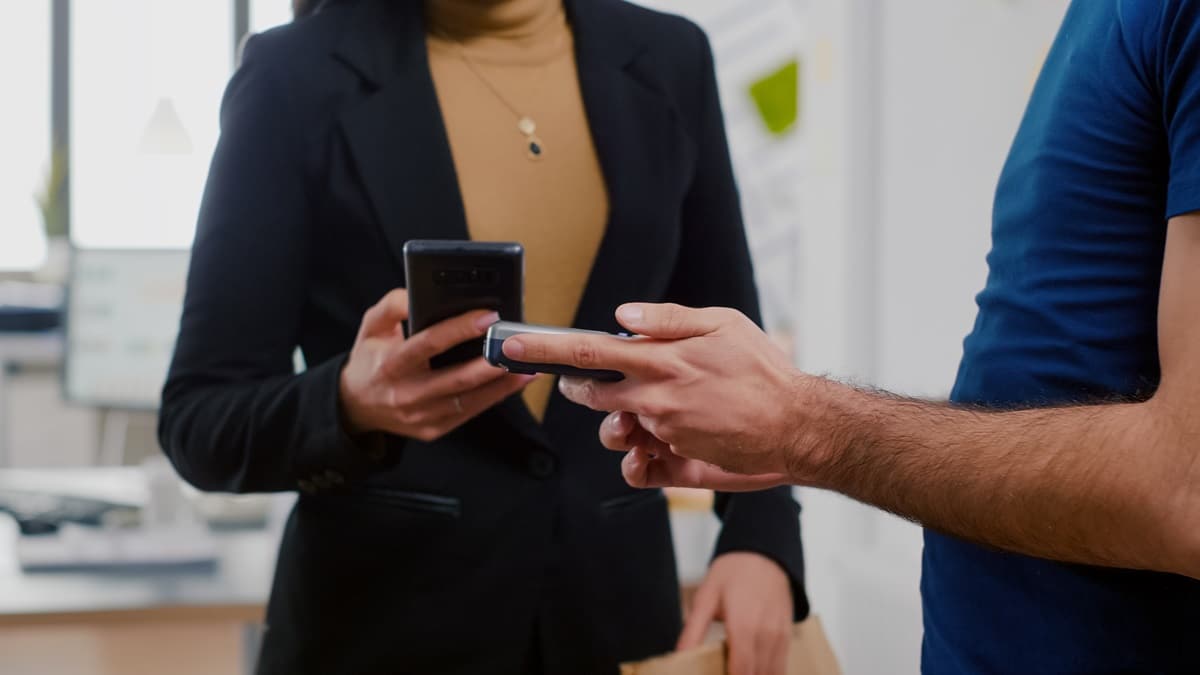 Person waiting for an SMS confirmation for a purchase