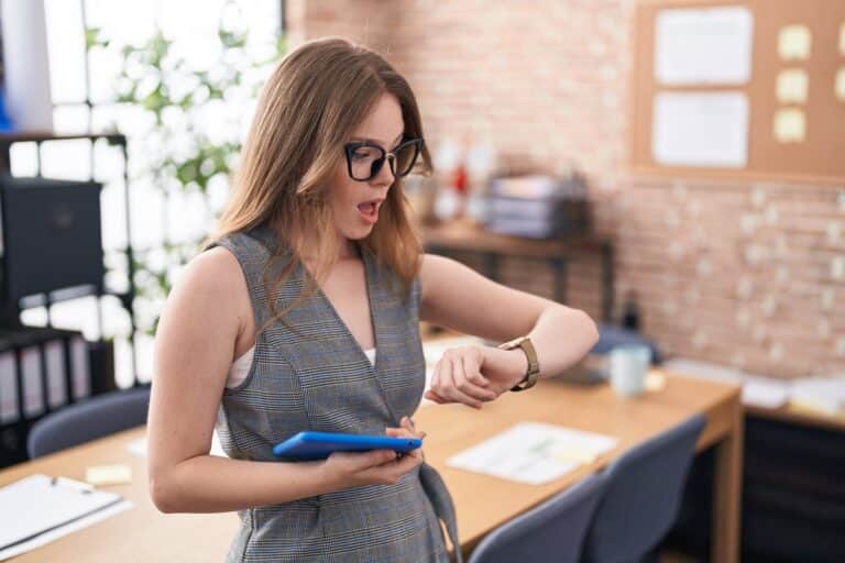 Businesswoman receiving an appointment reminder SMS