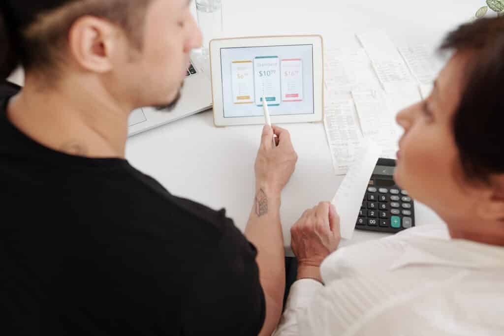 Colleagues deciding on a pricing plan