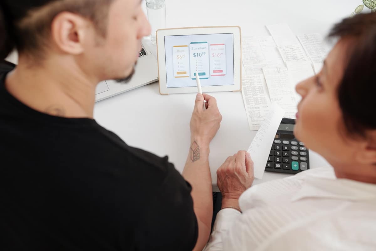 Colleagues deciding on a pricing plan